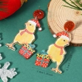 Detail view of acrylic Christmas chicken earrings with red scarf and measurement markings - Yellow Chick Style (WEH5569)