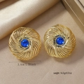 Detailed macro view of 3.4cm vintage gold heart alloy earrings with blue center gemstone - Spiral Radial Blue Gemstone Earrings / Royal Blue (WEH4974)
