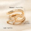 Macro shot showing dimensions and polished gold liquid-style hollow ring details - Abstract Minimalist Streamline Style (WR1031) / KC Gold (WR1031)