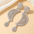 Dettaglio di orecchini in lega d'argento con trafori geometrici e stile retrò bohémien - Stile Filigrana Boho Argento (WEH4925)