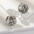 Close-up of floral silver earrings with sparkling rhinestone center and glossy pearl drops - Silver (WEH5431)