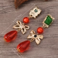 Detailed view of vintage crystal earrings with measurements in centimeters and inches - Red Bowknot Teardrop Dangle Earrings (WEH5606)