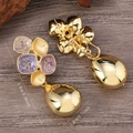 Detail view of vintage enamel floral earrings with polished gold teardrop pendants - Purple Enamel Flower Vintage Dangle Earrings (WEH5605)