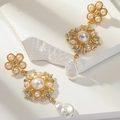 Boucles d'oreilles dorées vintage avec perles en nœud et perles baroques - Style de Cour Baroque
