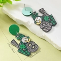 Macro view of Saint Patrick's Day acrylic earrings with gnome and plaid clover patterns - Gnome Letter Collage Style (WEH5927)