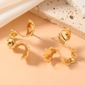 Modern golden irregular wave stud earrings with a melted metal texture on stone background - Lava Texture Irregular Wave Style (WEH5693)