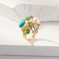 Dettaglio anello stella marina con perle, pietre turchesi e fascia dorata - Oro d'imitazione multicolore (WR1137)