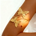 Elegant gold double butterfly arm cuff with hollow wings and intricate metallic texture - Double Butterfly Style (WB441) / Imitation Gold (WB441)