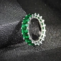 Eternity ring featuring emerald-cut green cubic zirconia in silver-tone setting - US 5 / Green