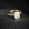Elegant gold ring with a large rectangular cut gemstone and side diamond accents - Number 5 / Gold