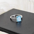 Elegant S925 sterling silver ring with rectangular light blue gemstone and white diamonds - Blue