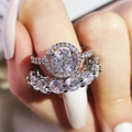 Women's sparkling zircon ring set with halo solitaire and matching eternity band - US 5 / White
