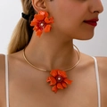 Close-up of vibrant orange flower jewelry set with white pearls and gold choker - Orange Flower Choker Earrings 2-Piece Set / Orange (t250912-8)