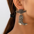 Detail of vintage gold cowboy hat and boot earrings with boho star engraving on model - Vintage Gold Cowboy Boot Style (en-19-e051-2)