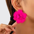 Macro detail of large 3D fuchsia floral earrings with layered matte petals on a model - Bright Magenta Flower Style (E3-1-04)