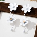 Detailed macro of white matte flower earrings with textured petals and golden stamen center - White Mesh-Texture Long Flower Drop Earrings (en-19-e027-White)
