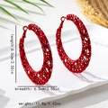 Macro view of 6.5cm red matte filigree hollow hoop earrings on a marble stone tray - Red Hollow Large Hoop (E1-2-12)