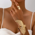Detail of vintage gold eagle cuff bracelet and matching ring with feather texture - Eagle Wing Shape Set (s250912-1)