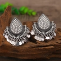 Macro shot of silver boho earrings with rhinestones and metal sequins on wood base - White Antique Silver (weh3400)