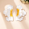 Detail of oversized enamel flower earrings with white and yellow petals and gold edges - White Pearl Drop Earrings