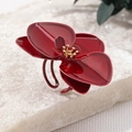 Macro detail of glossy red flower ring with gold stamens and adjustable open band - Wine Red Ring