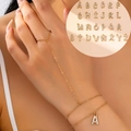 Λεπτομέρεια από βραχιόλι δαχτυλίδι 18K χρυσό με γράμμα Α και λαμπερά ζιργκόν - Γράμμα Β (s-1-s033)