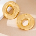 Detailed view of large gold-plated hollow geometric earrings with hammered texture finish - Earrings Only