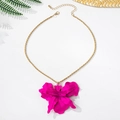 Macro shot of large pink orchid pendant on gold chain for tropical beach vacations - Necklace / Rose Red