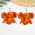 Detail of vibrant orange gradient orchid drop earrings with a tropical vacation style - Stud Earrings / Orange
