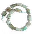 Natural light green stone cylindrical beads with transparent round spacers on a blue string - Cylinder / Australian Jade