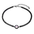 Double-row black rhinestone choker featuring a gothic pink devil eye pendant in gunmetal - Black with Pink Flowers