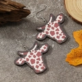 Cow head earrings with red white cow print pattern on a natural autumn backdrop - Red and White Cow Print (WEH3922)