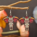 Ethnic wood sugar skull earrings featuring colorful Mexican Dia de los Muertos floral patterns - Colorful Ox Skull Shape (WEH3903)