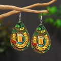 Detail of wooden teardrop earrings with horseshoe and clover print for St. Patrick's Day - Horseshoe Beer (WEH4239)