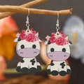 Cartoon cow wood earrings with red flower crown hanging on a natural tree branch - White Floral Cow Shape (WEH3907)