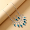 Close-up of bridal necklace set with blue marquise crystals and silver pavé details - Light Blue