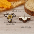 Detail view of cow head wooden earrings showing sunflower pattern and size measurements - Yellow Sunflower Print (WEH4313)