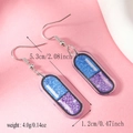 Detailed view of capsule earrings with blue and purple glitter acrylic showing dimensions - Blue Purple Glitter Capsule Style (WEH4633) / Purple