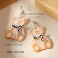 Detail view of cute orange acrylic bear earrings with leopard print scarf and dimensions - Beige Bear (WEH4719)