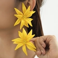 Handcrafted vibrant yellow 3D floral beaded earrings featuring multi-layered resin petals - Yellow
