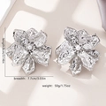Exaggerated silver flower earrings with hammered texture and center pearl detail - Ruffled Large Flower Style / Silver