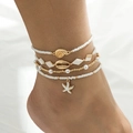 Set de tobilleras bohemias con estrella de mar dorada y perlas para look playero - Blanco