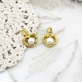 Detail of two heart-shaped gold pendants with white pearls on white lace background - Pearl Hollow Heart / 11*11mm