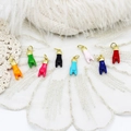 Detailed view of colorful enamel hand gesture charms for DIY necklace and jewelry making - Gesture Style / Green