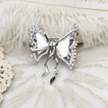 Close-up of luxury butterfly brooch with shimmering mother-of-pearl and inlaid zircon stones - 42*55mm / Zirconia Mother of Pearl Ribbon Butterfly Style (G0537)