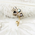 Detail of gold lily of the valley brooch setting with zircons and dark shell petals - 26*52mm / Black Mother of Pearl Flower