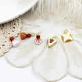 Detailed close-up of 5-piece dessert enamel pendants with strawberry and cupcake designs - Triangular Strawberry Cake