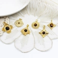 Detailed view of 6-piece vintage 18k gold plated tiger eye pendants in various shapes - Hollow Four-Leaf Clover Tiger's Eye (22.5*25mm)