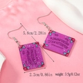 Dettaglio orecchini a cuore in acrilico viola con glitter e motivi a tavola Ouija - Stile Simbolo della Tavola Ouija (WEH3944)