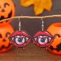 Close-up of Halloween earrings with red lips, teeth, and bloody eyeball on branches - Red Mouth Eyeball (WEH3736)